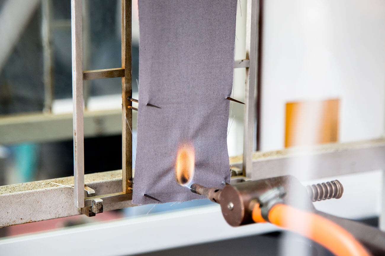 Treated fire resistant fabric